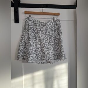 G/FORE Athletic White Skater Skirt with Gray Floral Print. Built in Shorts
